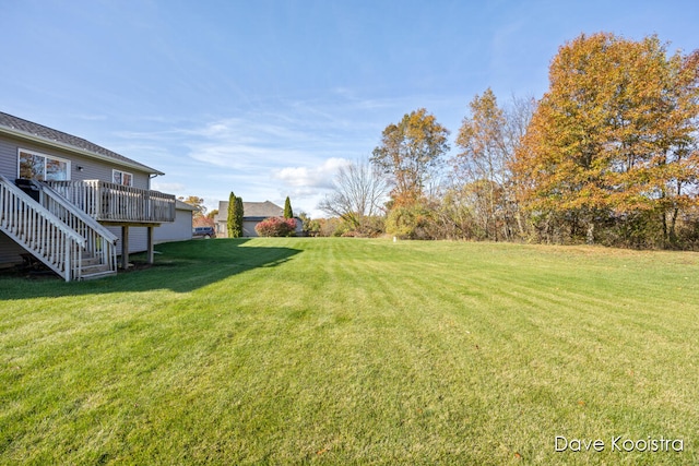 view of yard with a deck