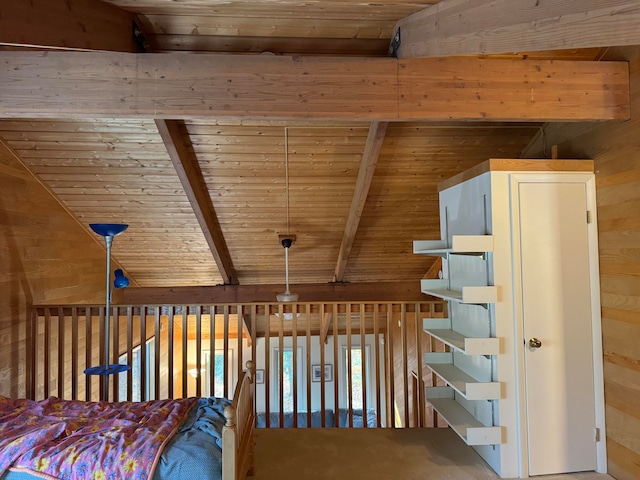 interior space with vaulted ceiling with beams, wooden walls, wood ceiling, and carpet floors