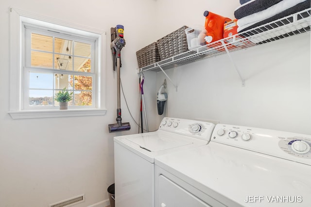 laundry room with washer and dryer