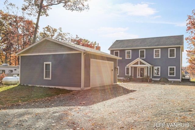 view of front of property featuring a garage