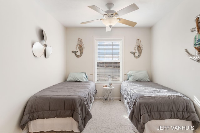 bedroom with ceiling fan and carpet