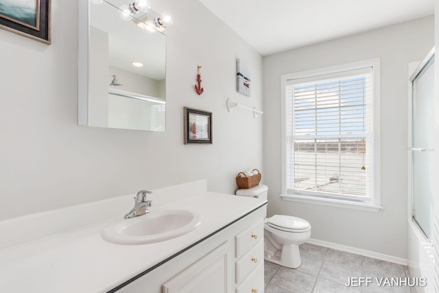 full bathroom with vanity, toilet, combined bath / shower with glass door, and tile patterned flooring