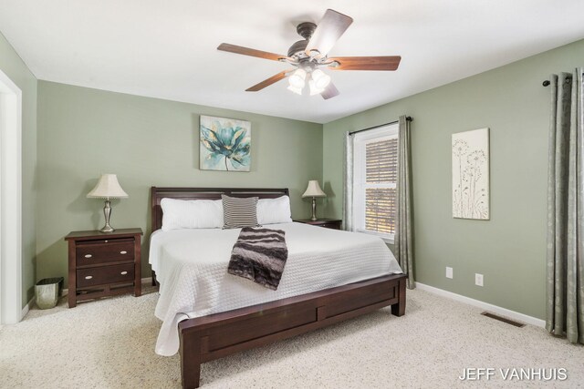 carpeted bedroom featuring ceiling fan