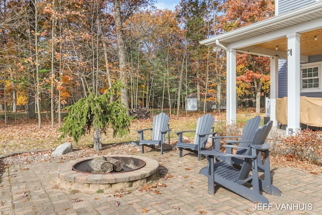 view of patio / terrace with a fire pit