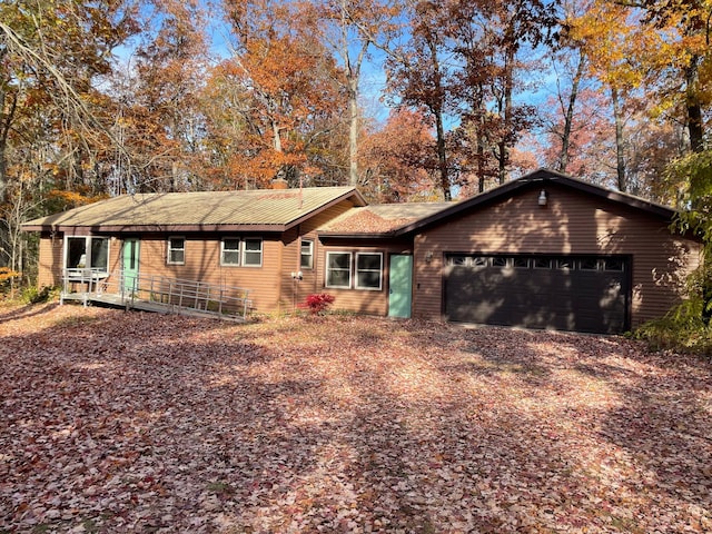 single story home featuring a garage