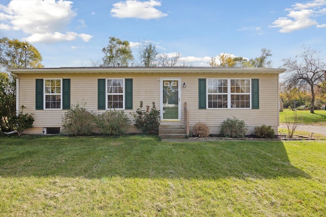 ranch-style house with a front lawn