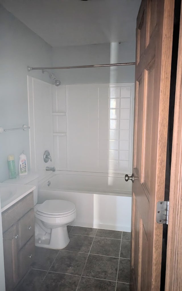 full bathroom with toilet, shower / bathing tub combination, vanity, and tile patterned flooring