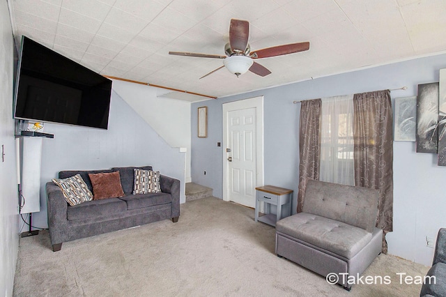 living room with light carpet and ceiling fan