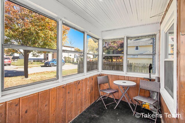 sunroom / solarium featuring plenty of natural light