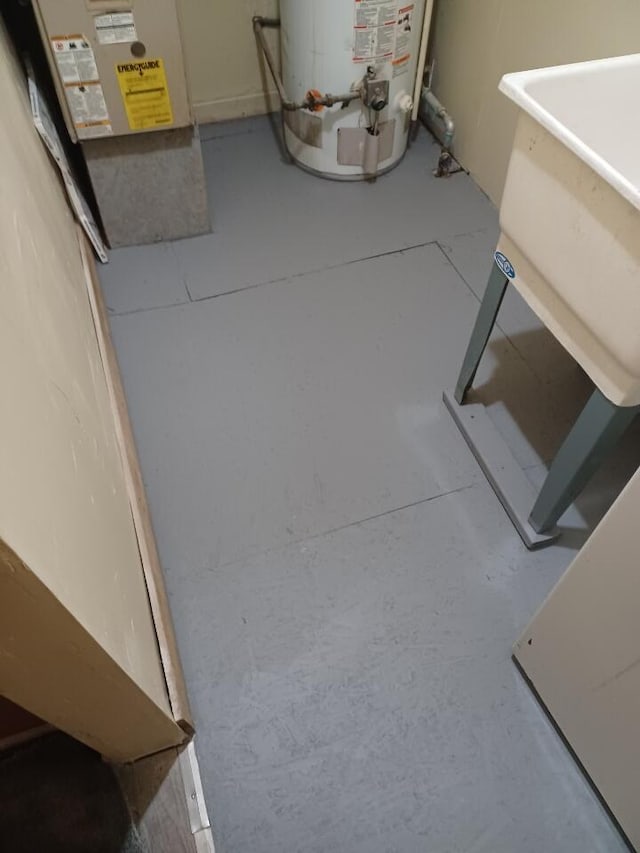 utility room with water heater