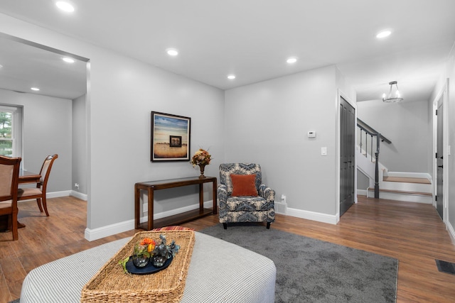 living area featuring dark hardwood / wood-style flooring