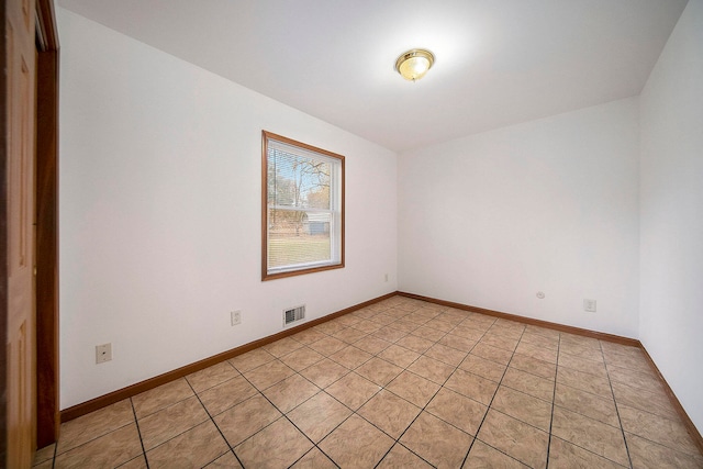 view of tiled spare room