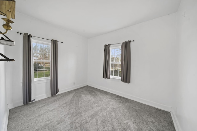 empty room with carpet flooring