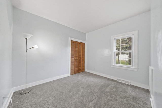 empty room with carpet floors