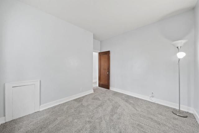 empty room featuring carpet floors