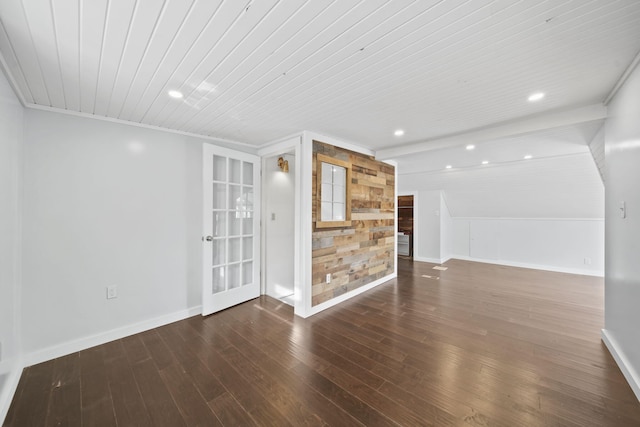 interior space featuring crown molding, french doors, wooden ceiling, and dark wood-type flooring