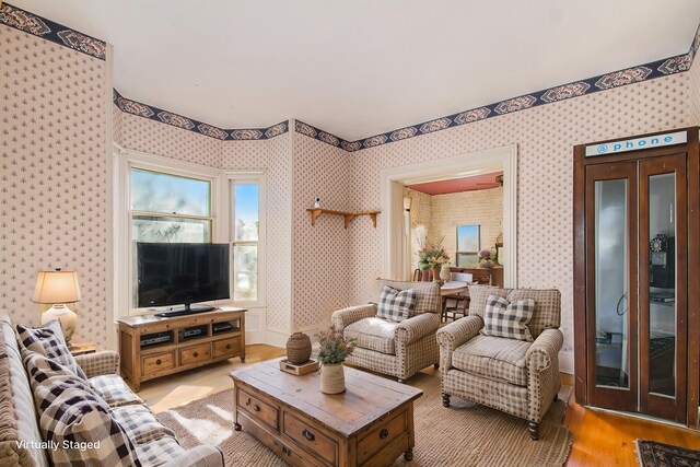 living room featuring light wood-type flooring