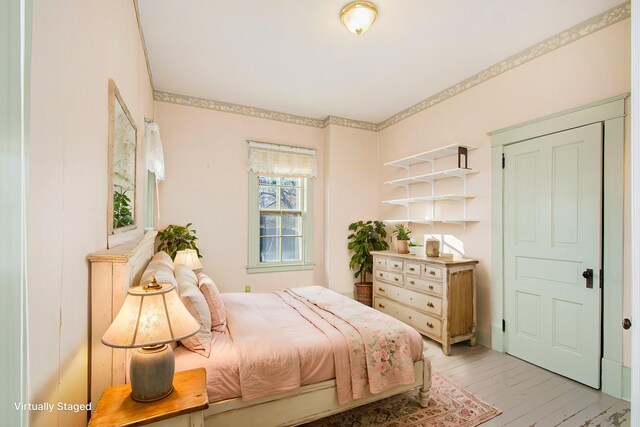 bedroom featuring light hardwood / wood-style floors