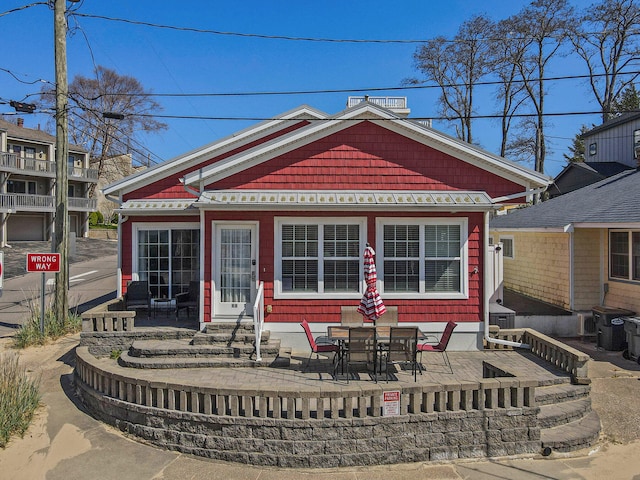 back of property featuring a patio area