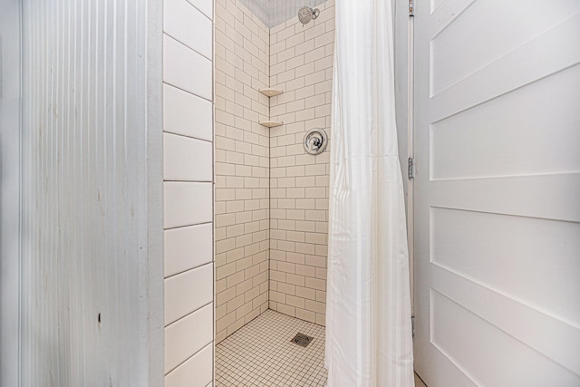 bathroom with a shower with shower curtain