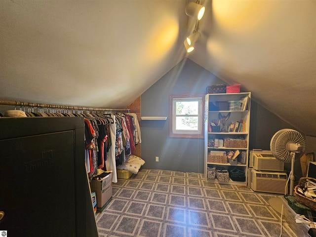 spacious closet featuring lofted ceiling