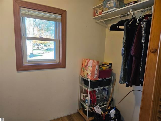 spacious closet featuring hardwood / wood-style floors