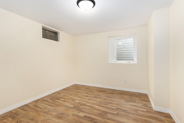 spare room featuring light wood-type flooring