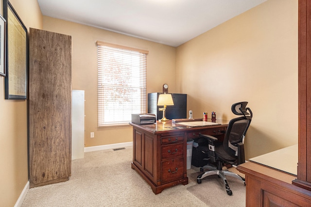 home office with light carpet