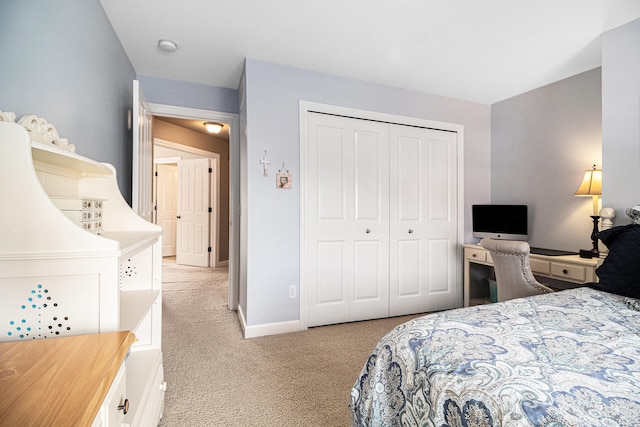 carpeted bedroom with a closet