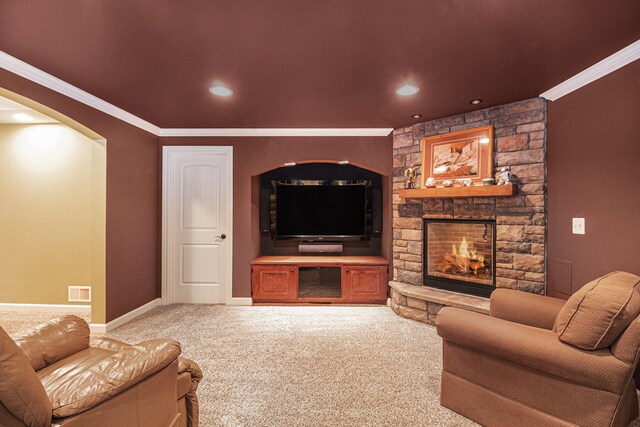 carpeted living room with crown molding and a fireplace