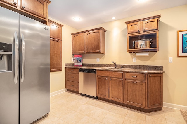 kitchen with sink and appliances with stainless steel finishes