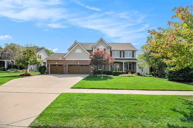 view of front of property with a porch, a front lawn, and a garage