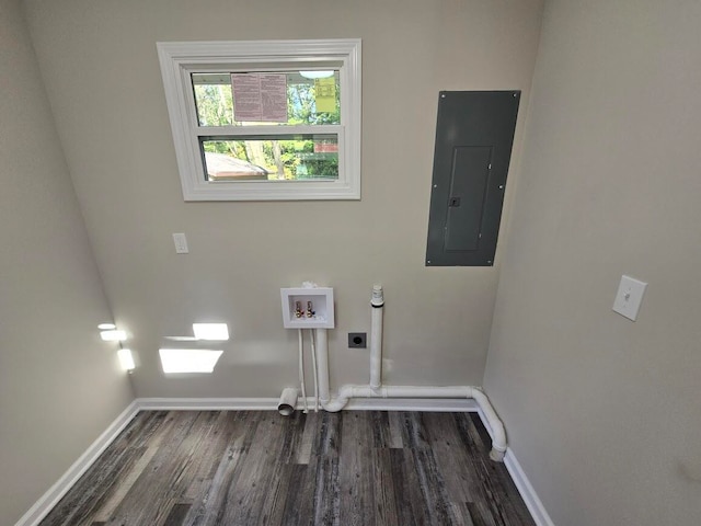 clothes washing area with electric panel, electric dryer hookup, dark wood-type flooring, and washer hookup