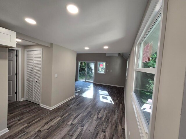 unfurnished room featuring dark hardwood / wood-style flooring