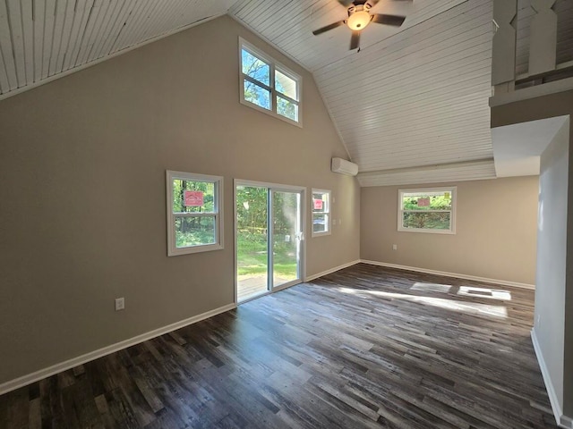 unfurnished living room featuring dark wood-type flooring, wood ceiling, an AC wall unit, and high vaulted ceiling