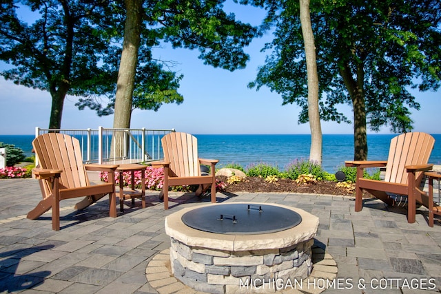 view of patio / terrace with a water view