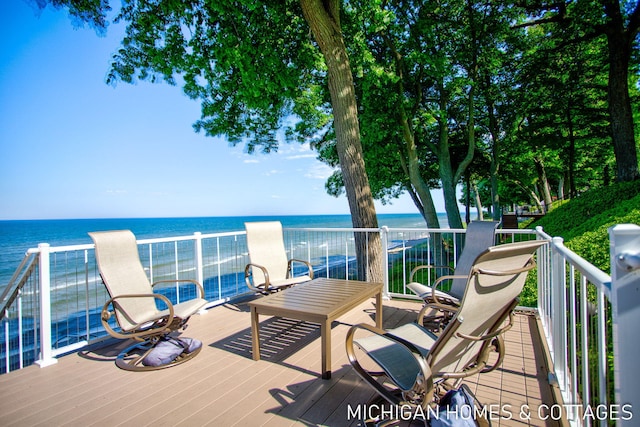 deck featuring a water view