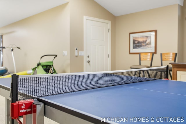 game room with lofted ceiling and carpet flooring