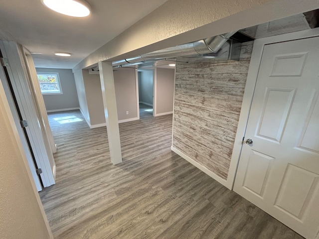 basement featuring hardwood / wood-style flooring