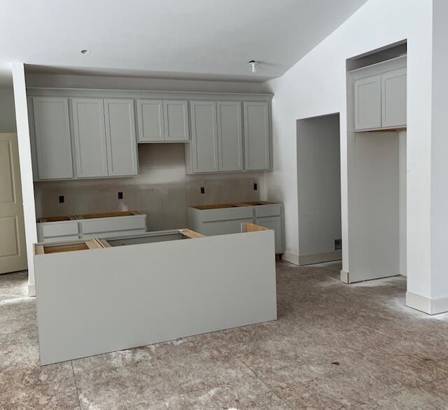 kitchen featuring a center island and gray cabinets