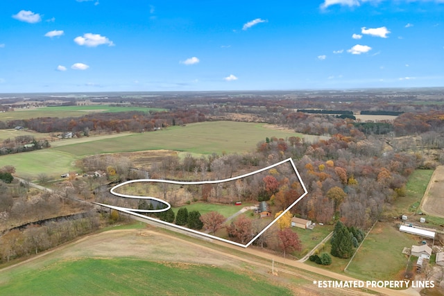 birds eye view of property featuring a rural view