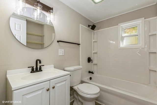 full bathroom featuring toilet, vanity, a textured ceiling, and shower / washtub combination