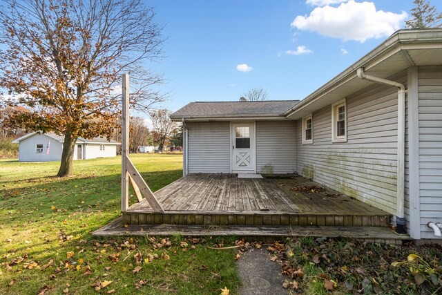 deck featuring a yard