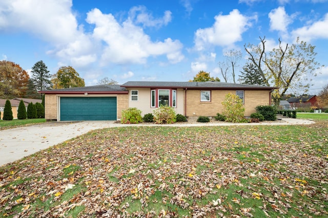 single story home featuring a garage