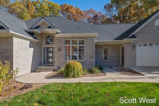 ranch-style home featuring a garage