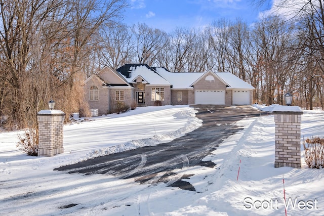 view of front of property with a garage