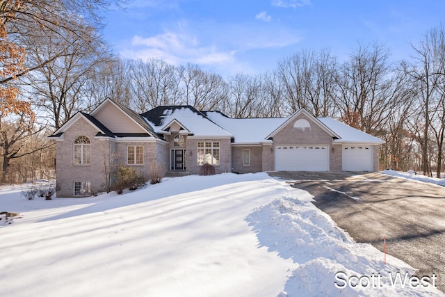 single story home with a garage