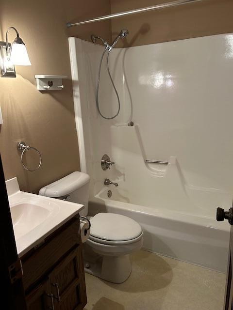 full bathroom featuring vanity, shower / tub combination, and toilet