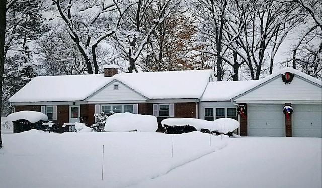 ranch-style home with a garage