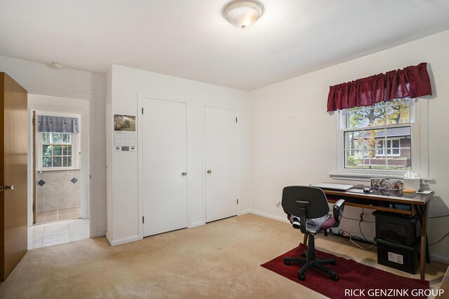 4102 Highgate Rd, Norton Shores, MI 49441 - carpeted office space featuring baseboards